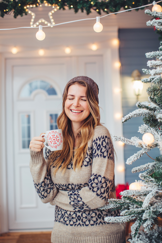 Woman looking peaceful and relaxed during the festive season.